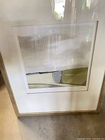 Oblique view of framed Far Fields artwork showing frame, mat, image and signature