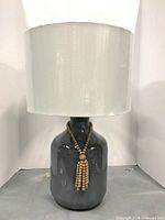 Lamp full view with shade and bead collar