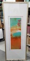 Full view of framed art showing abstract design and frame
