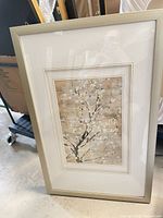 Vertical framed blossom branch print with rectangular mat opening