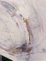 Close-up of textured gold and grey paint detail