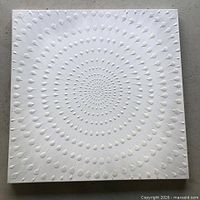 Front view of square white canvas showing full concentric droplet design