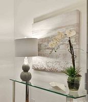 Full view of the square abstract canvas hung on wall