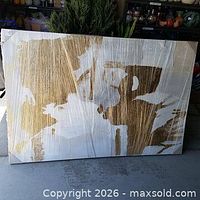 Front view of abstract canvas art wrapped in protective film