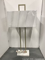 full view of lamp showing shade, stem and marble base