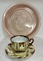 Platter, teacup and saucer grouped for overall view