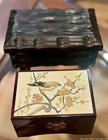 Closed rustic wood box and Chokin Art jewelry box showing exterior finishes and engraved lid design