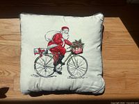 Front view of Santa bicycle pillow