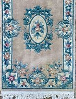 Full view of rug showing pattern, border, fringe