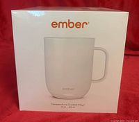 Front of sealed retail box showing Ember Temperature Control Mug² 14 oz image and branding