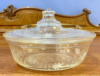 casserole dish with lid showing etched floral design