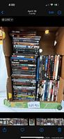 Full box showing stacked DVD cases