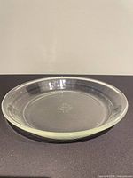 Top view of clear glass Fire-King pie plate