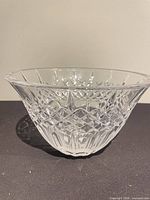 Side profile of clear cut crystal bowl showing diamond pattern and flared rim