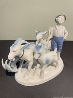 Front view showing boy herder and four goats, color highlights and base detail