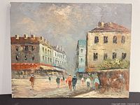 Front view of oil on canvas cityscape painting