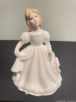 Front view of Royal Doulton Amanda figurine showing dress details and facial features