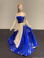Front view of Royal Doulton Olivia figurine showing full gown and pose