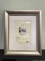 Front view of silver 8x10 frame displaying mat and insert