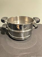 Steamer insert stacked on base pot
