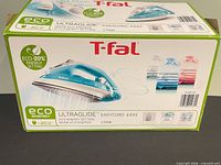Front of T-fal UltraGlide Easycord 4493 steam iron retail box showing product image and specifications