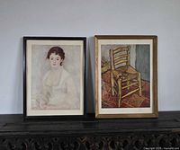 Both framed prints side by side on surface