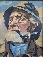 Full view of framed needlepoint portrait