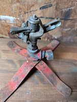 Full view of sprinkler showing base and head