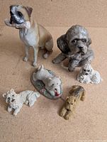 Group shot of all six dog figurines