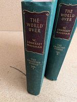 Spine view of both volumes showing titles and author