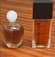 Rumba and Anne Klein II miniature perfume bottles side by side