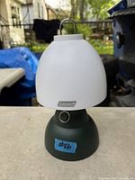 Front view of Coleman battery lantern showing diffuser, base, and hanging loop