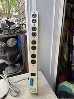 Full view of Hammond power bar showing eight outlets, switch and cord