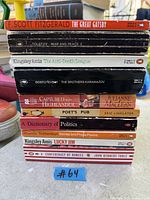 Stack of ten identified paperback books