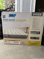 Factory-sealed box showing Intex Dura-Beam Standard 10-inch queen air mattress