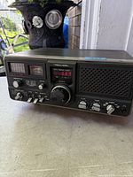 Front view of Realistic DX-302 receiver showing controls and display