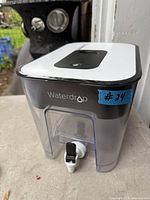 Front angled view showing Waterdrop dispenser and spout