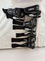 All eight Cleveland headcovers laid out showing branding and club identifiers