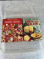 Front covers of both cookbooks