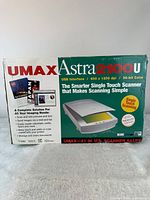 Front of box showing model, resolution, color depth, and feature list