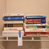 Stack of health, medical and nutrition books on shelf
