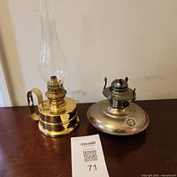 Both oil lamps side by side showing overall form and size comparison