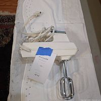 Top view of mixer with cord and beaters