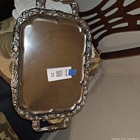 Full view of silver-plated ornate serving tray