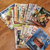 All magazines fanned on floor, both stacks visible