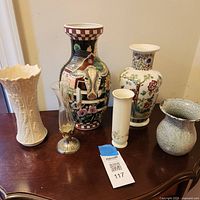 All six vases grouped on table