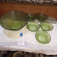 Full set showing large bowl and five small bowls