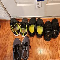 Four pairs sneakers lined up showing variety