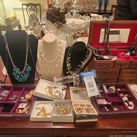 Overall lot view with busts, jewelry chest, trays