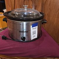 Full view of slow cooker with lid and cord
